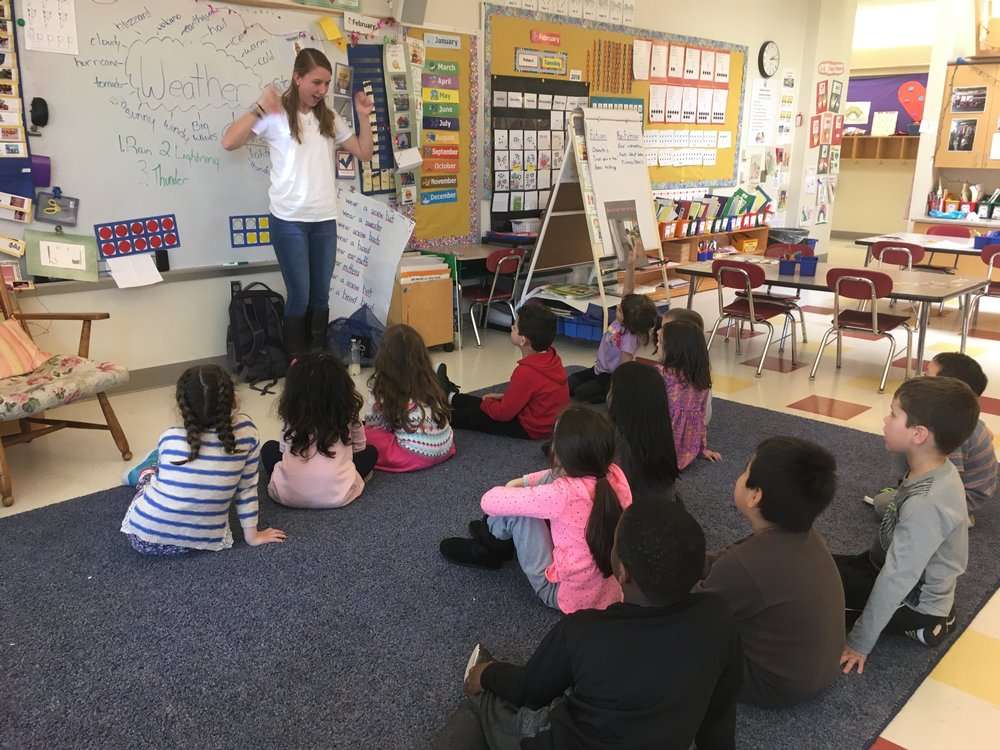   Megan leading a lesson on thunderstorms and their environmental impact at McKinley Elementary School  