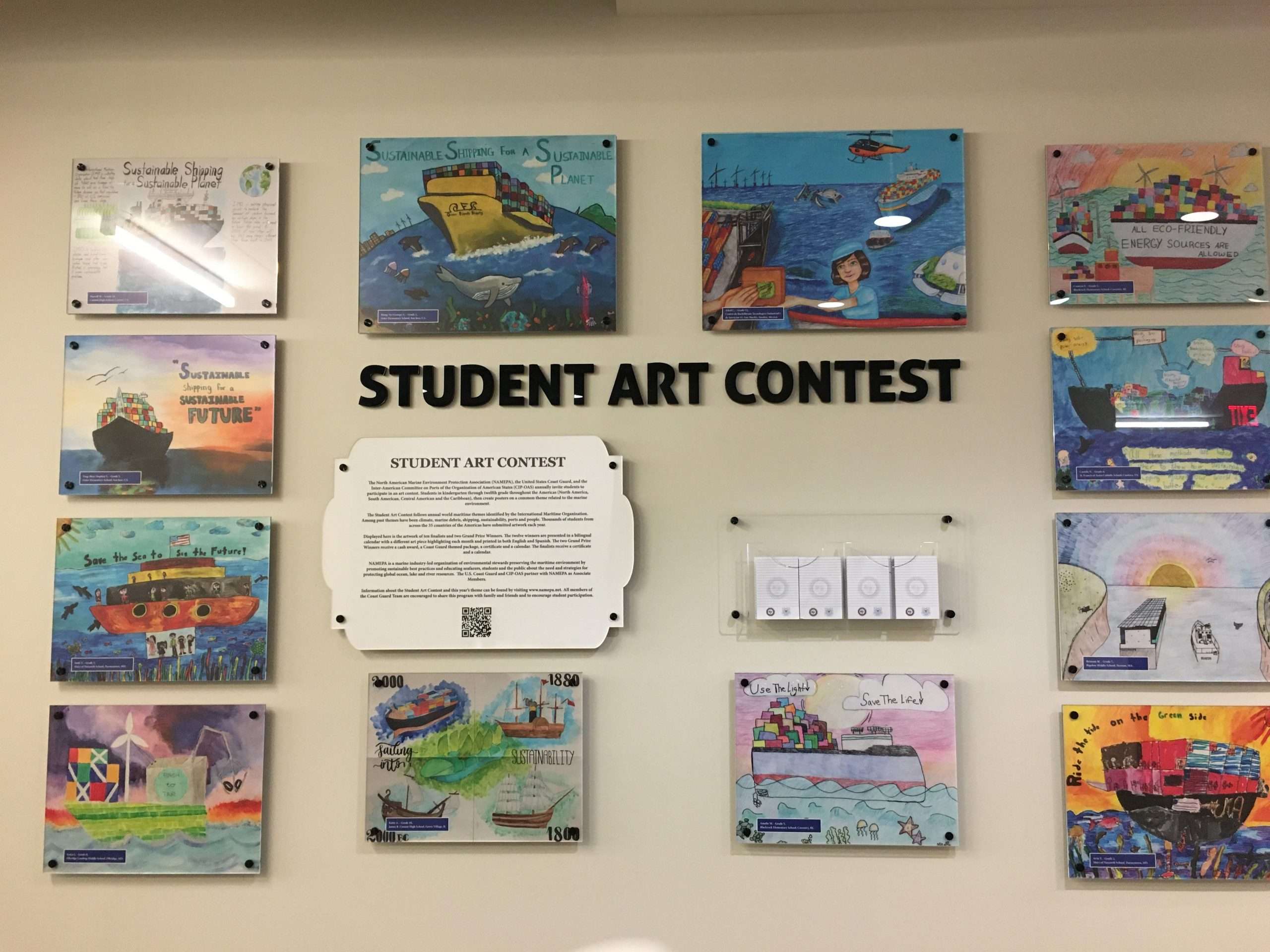 NAMEPA and USCG Annual Art Calendar Contest. CGHQ display showing student artwork.